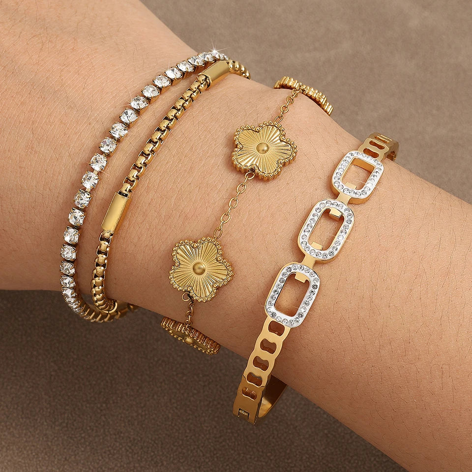 Zircon Blossom – Gold Bangle Trio