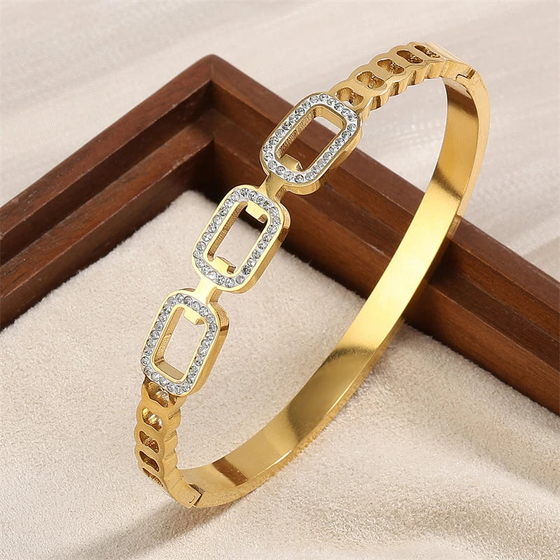 Zircon Blossom – Gold Bangle Trio