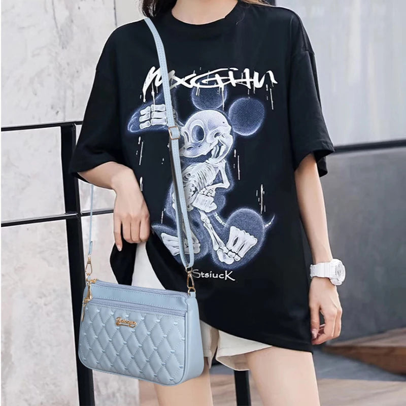 Luna Embroidered Charm Bag