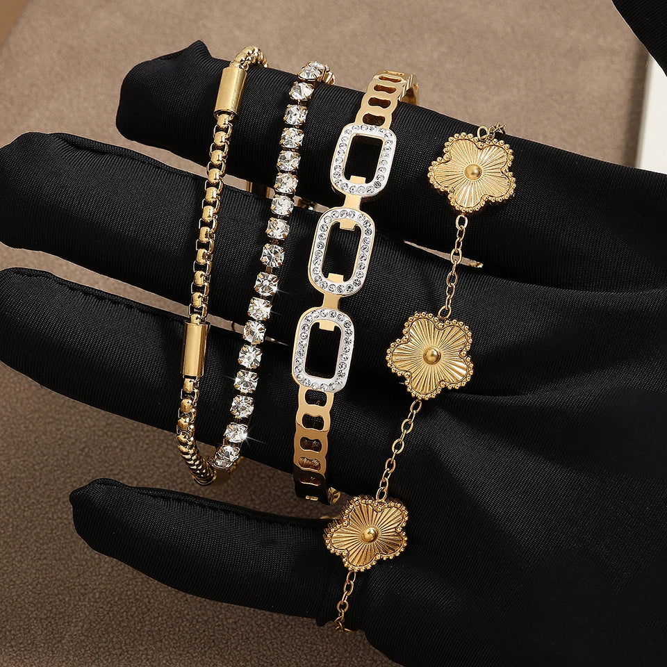 Zircon Blossom – Gold Bangle Trio